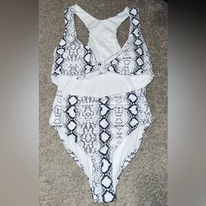 Never worn one piece bathing suit